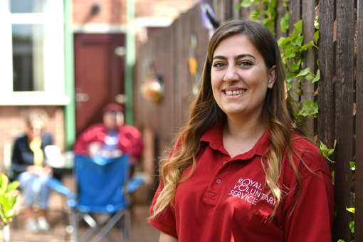 Royal Voluntary Service volunteer visiting people in the community