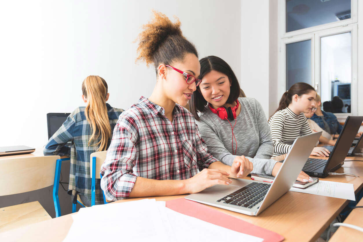 2 young women in class